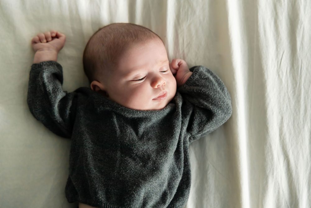 Natural light newborn photos of baby in neutral tones, simple and timeless Cleveland newborn session