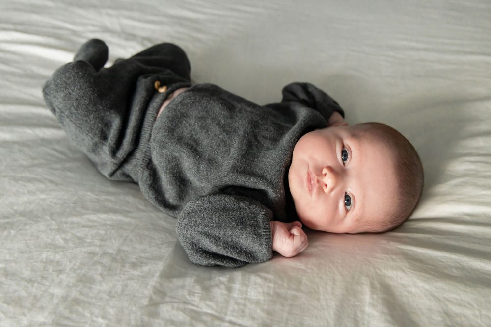 Natural light newborn photos of baby in neutral tones, simple and timeless Cleveland newborn session