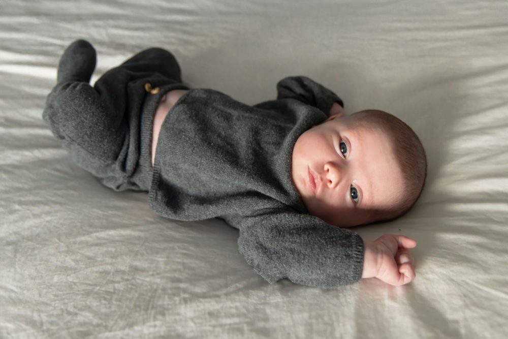 Natural light newborn photos of baby in neutral tones, simple and timeless Cleveland newborn session
