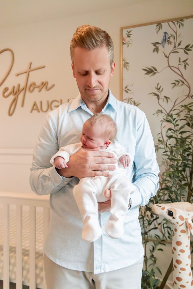 Father and daughter in natural light nursery in Cleveland Ohio