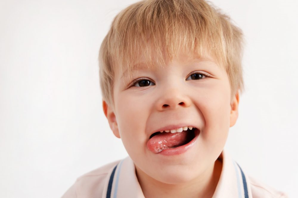 Smiling young boy studio portrait in Cleveland, Ohio by family photographer