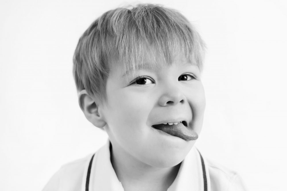 Smiling young boy studio portrait in Cleveland, Ohio by family photographer