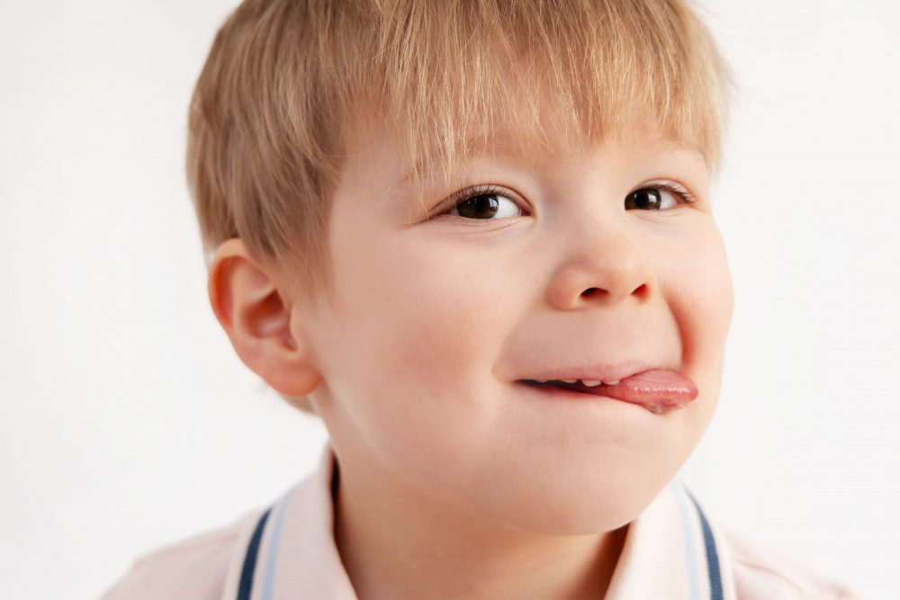 Smiling young boy studio portrait in Cleveland, Ohio by family photographer