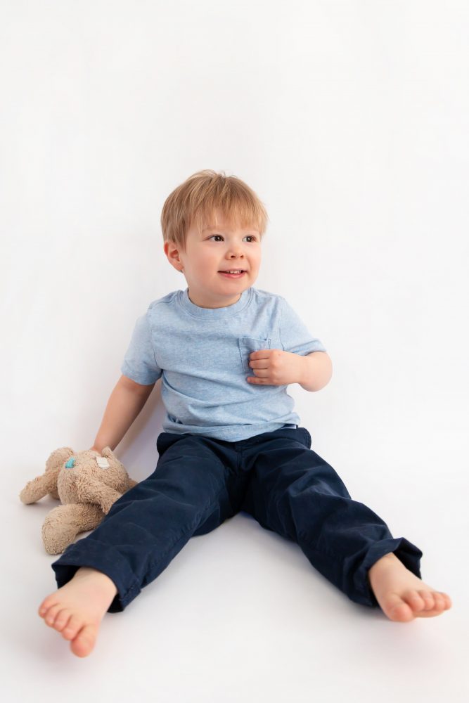 Smiling young boy studio portrait in Cleveland, Ohio by family photographer