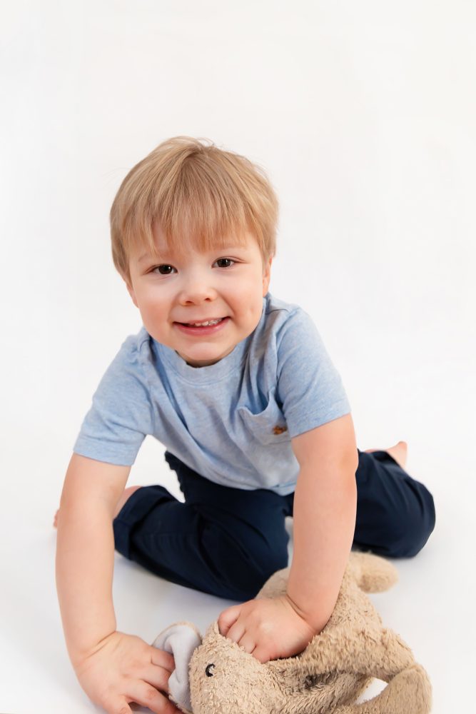 Smiling young boy studio portrait in Cleveland, Ohio by family photographer