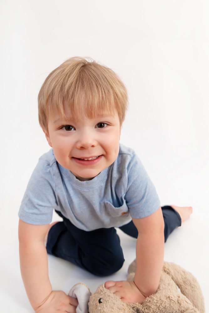 Smiling young boy studio portrait in Cleveland, Ohio by family photographer