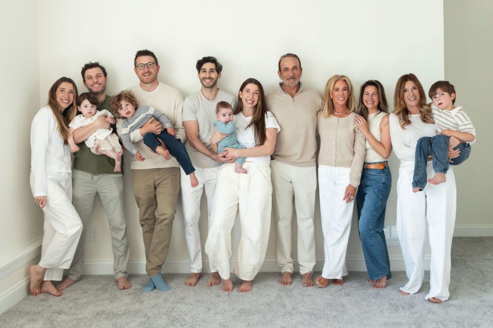 Multi-generational family photography session at home in Cleveland with grandparents, grandchildren, and the family dog