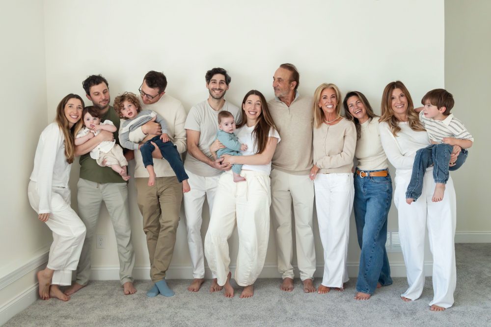 Multi-generational family photography session at home in Cleveland with grandparents, grandchildren, and the family 