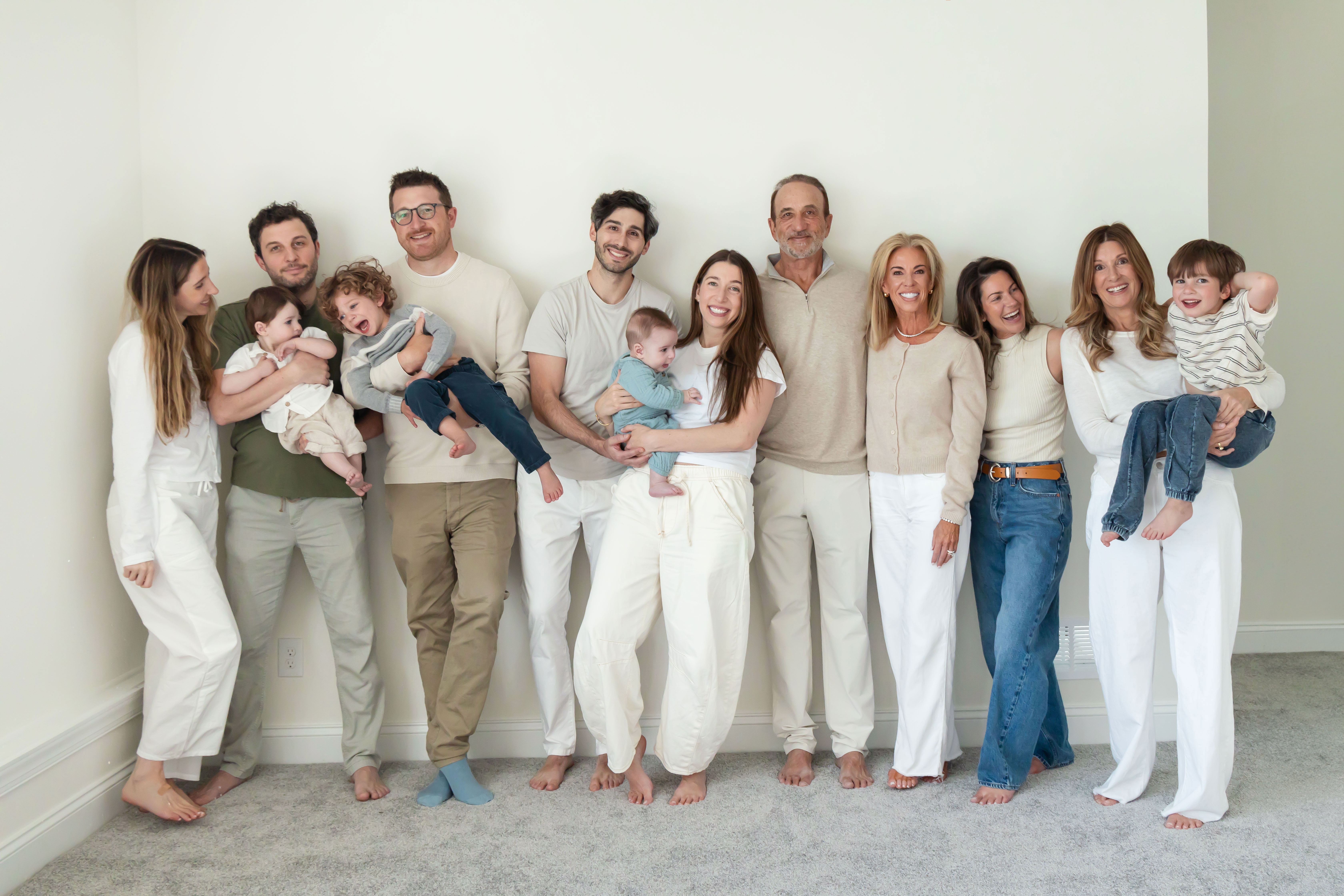 Three generations gathered for a relaxed family portrait outside their Cleveland home.