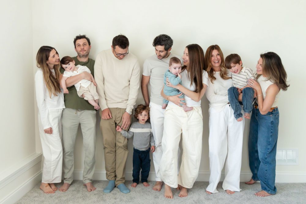 Three generations gathered for a relaxed family portrait outside their Cleveland home.