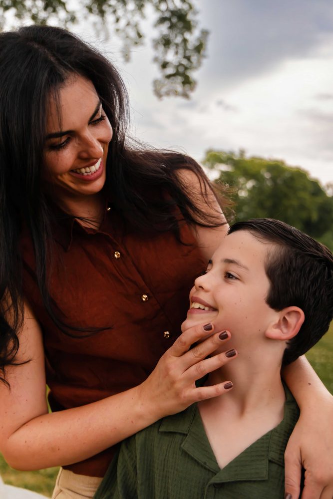 Outdoor family photos in Cleveland during golden hour with mother and son
