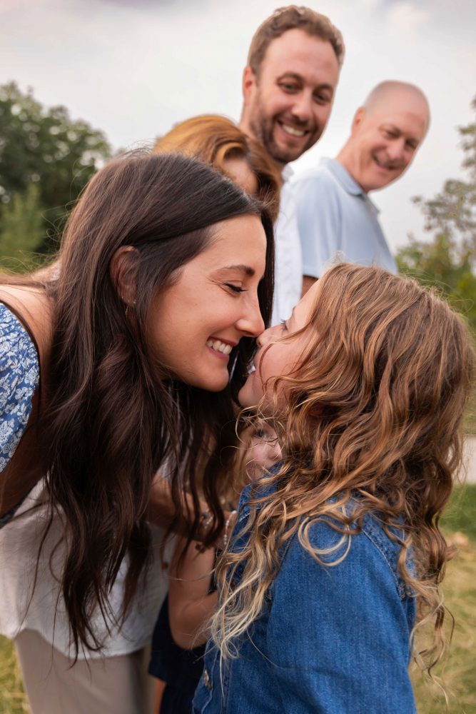 Extended family enjoying a warm sunset photography session in Cleveland Ohio