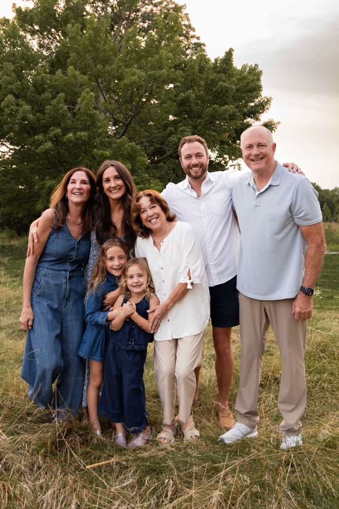 Extended family enjoying a warm sunset photography session in Cleveland Ohio