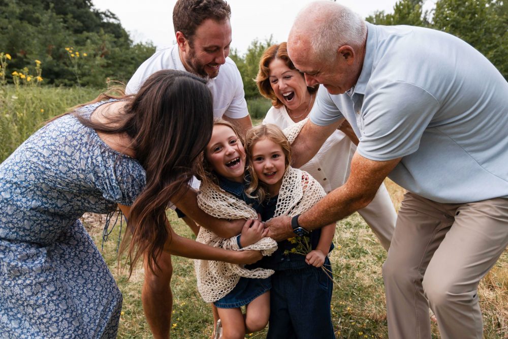 Cleveland family photographer photographing three generations together outdoors