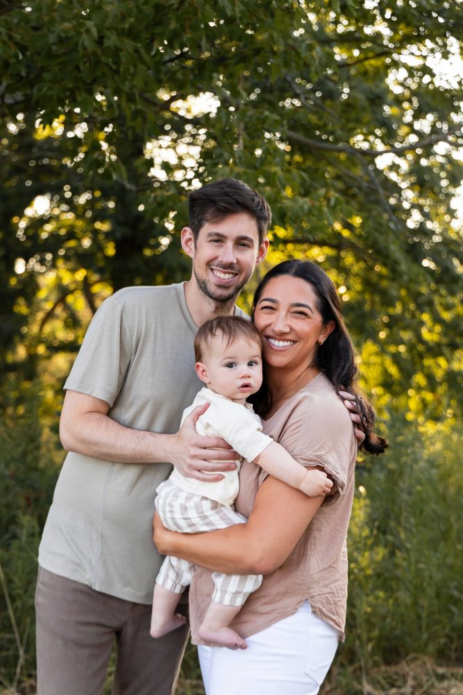 Cleveland family photographer Allison Liffman Photography captures a joyful candid moment between a mother and her baby boy outdoors.